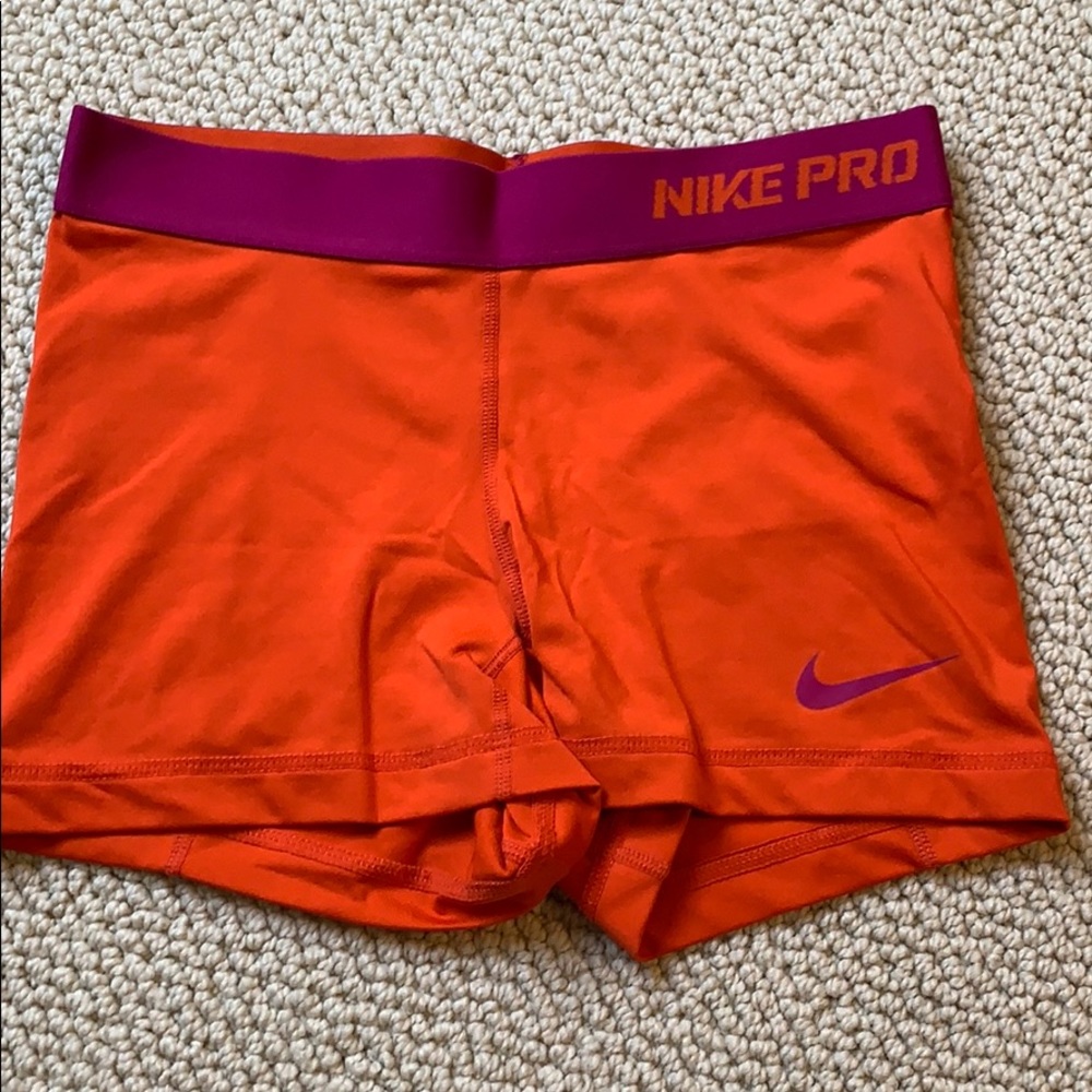 Orange w pink accents Nike pro shorts
